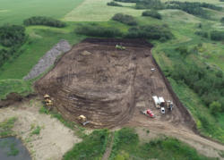 Machinery Working to Strip Topsoil, Subsoil and remove overburden from the gravel pit